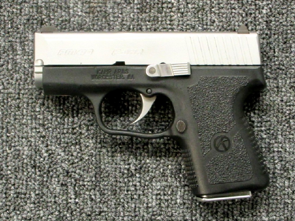 Preowned, Very Good Condition, Kahr PM40, .40 S&W, 3.0″ Barrel, 5 & 6 Rounds, 3 Magazines, White Dot Sights, Original Case & Manual, Leather Holster: Only $419!