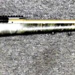 Preowned, Excellent Condition, Savage 110 Bolt-Action Rifle, .300 Win. Mag, 24″ Barrel, 3 Rounds, 1 Magazine, Green Splatter Synthetic Stock, FDE Barrel: Sold Sold Firearms