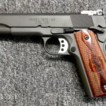 Preowned, Excellent Condition, Never Fired, Springfield 1911 Range Officer Steel-Frame Pistol, .45 ACP, 5.0″ Barrel, Adjustable Rear Sight, 7 Rounds, 4 Magazines, Walnut Grips: Sold Sold Firearms