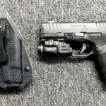 Preowned, Like New, Springfield Hellcat Pro Comp Sub-Compact Pistol, 9mm, 3.7″ Compensated Barrel, Adaptive Grip Texture, Tritium Front Sight, Tactical Rack U-Notch Rear Sight, (1)-15 Round & (2)-17 Round Magazines, Streamlight TLR-7X Weapon Light, Kydex IWB Holster: Only $569!